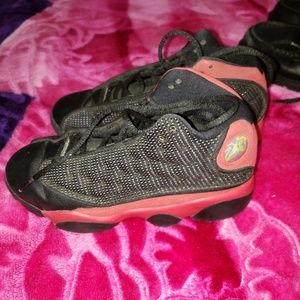 Red and black Jordans size 2